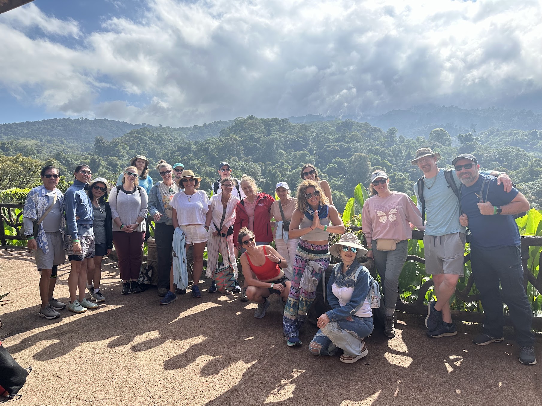 Retreat group gathering with mountain backdrop
